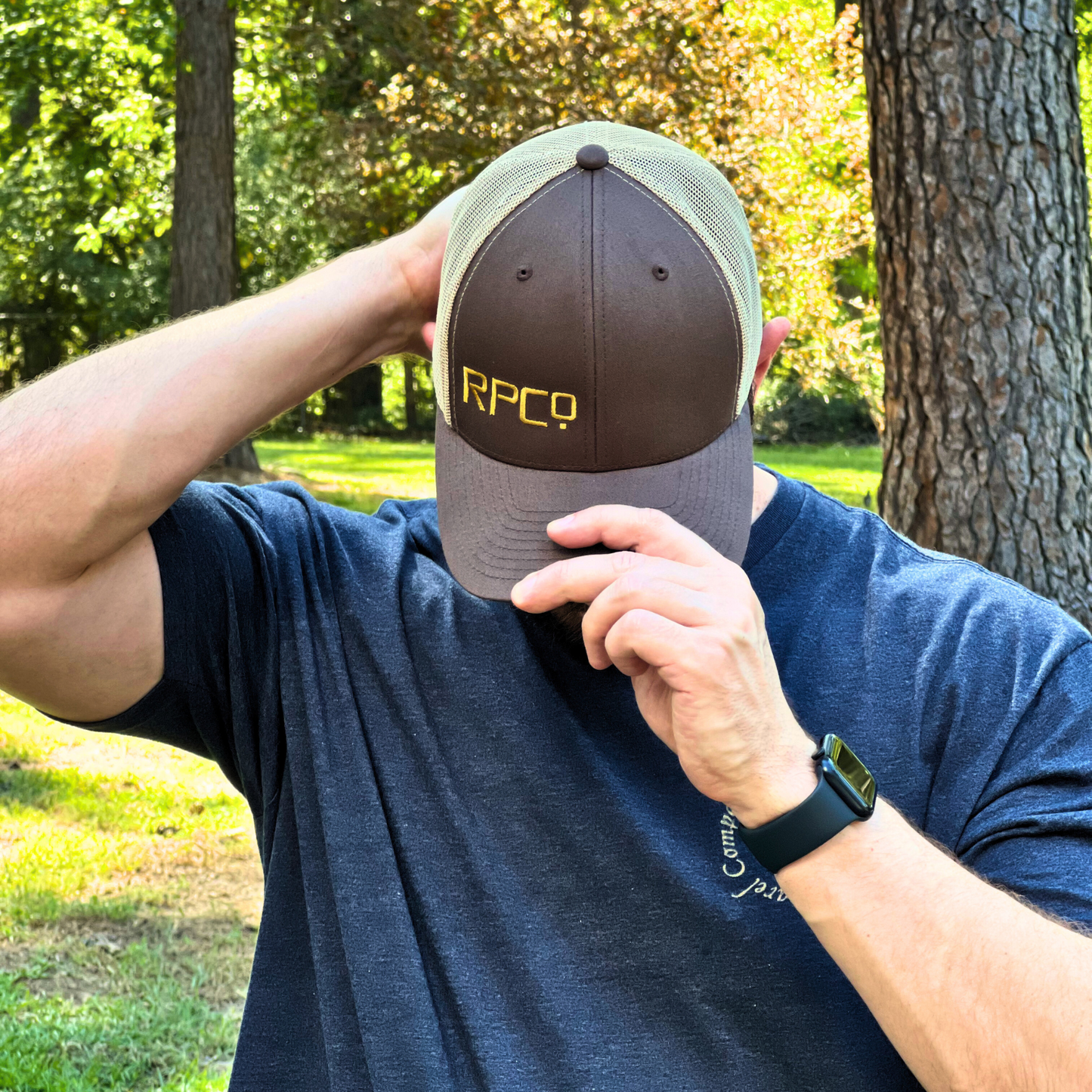 regular patriot offset embroidered snapback. Brown tan, front wearing outside.